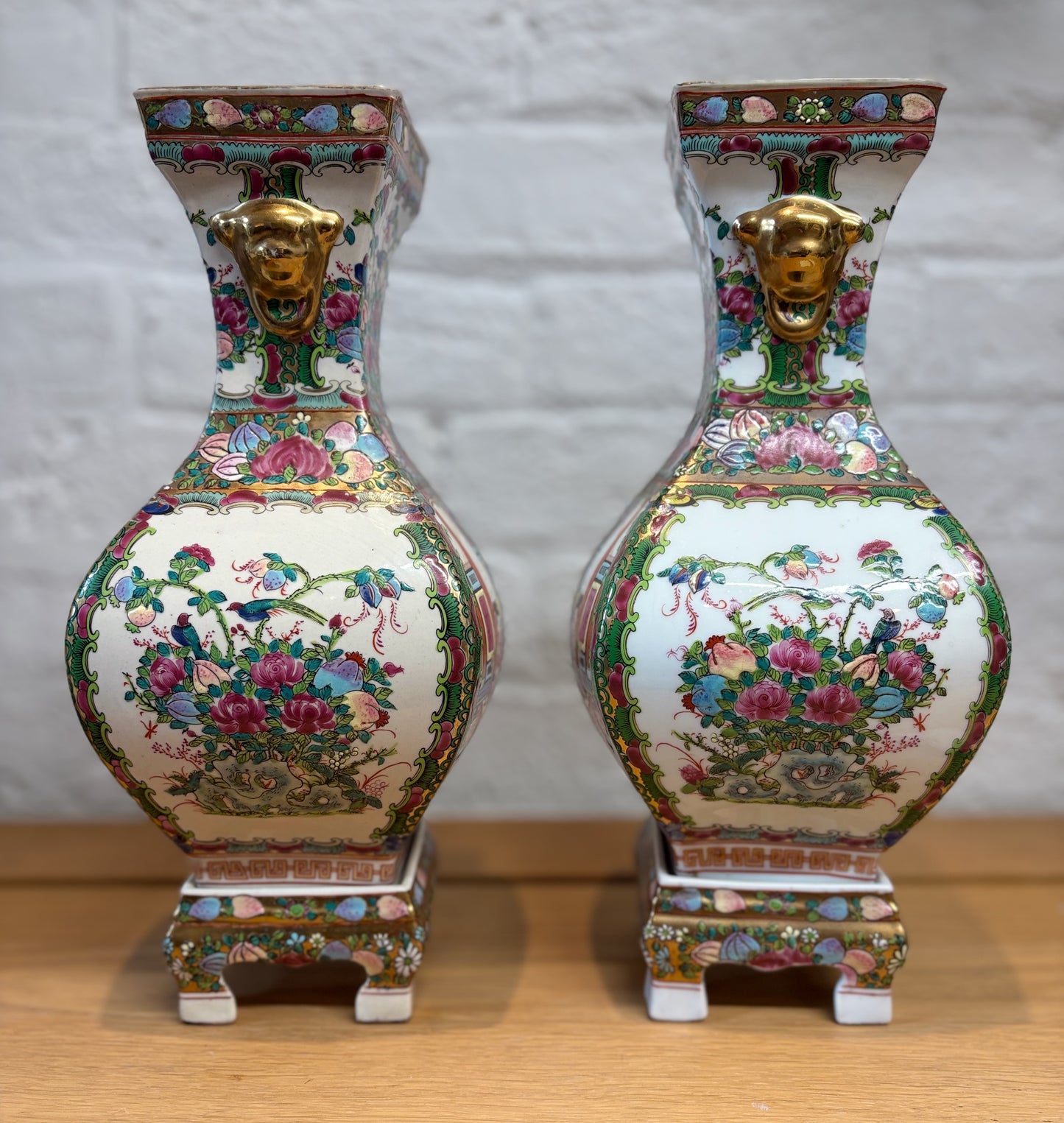 Pair of Late 20th‑Century Chinese Famille Rose Vases on Porcelain Stands
