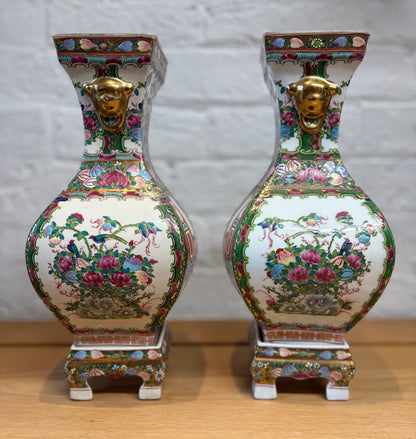 Pair of Late 20th‑Century Chinese Famille Rose Vases on Porcelain Stands
