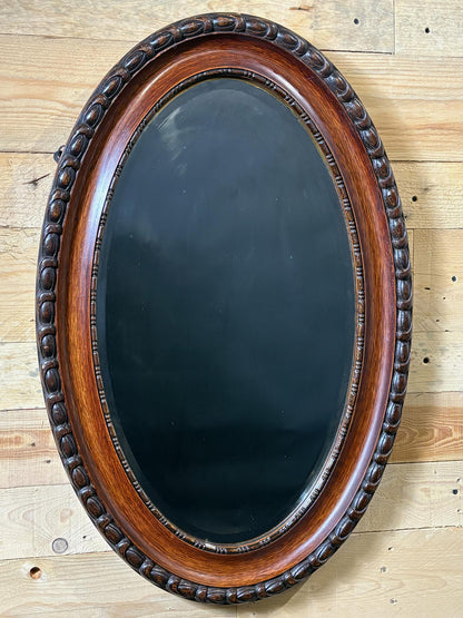 Edwardian Oval Bevelled Wall Mirror with Rope‑Carved Oak Frame