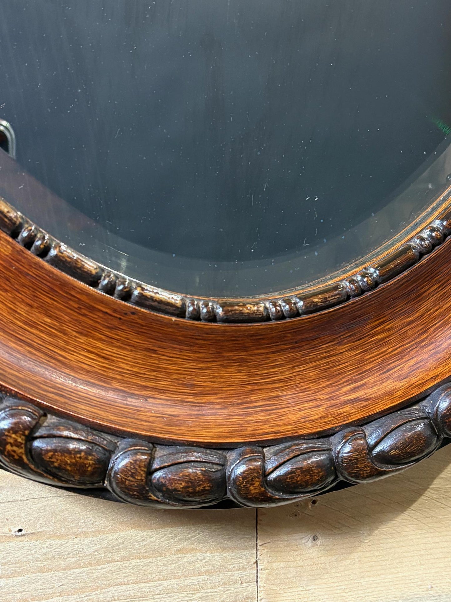 Edwardian Oval Bevelled Wall Mirror with Rope‑Carved Oak Frame